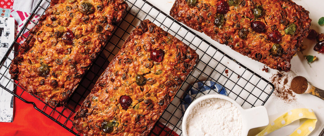 Fruitcakes cooling on a wire rack