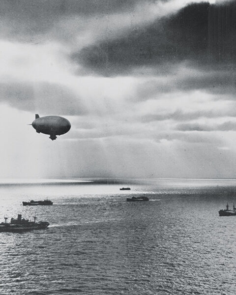 Blimp flying over Naval convoy