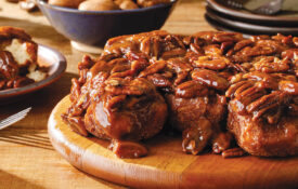 Caramel-pecan stickies on a tray